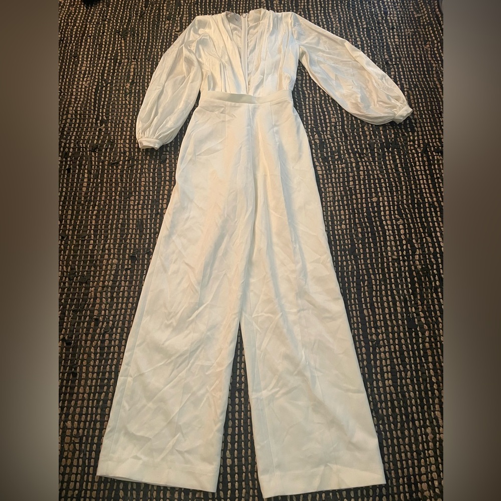 Wide leg deep front v-cut white jumpsuit